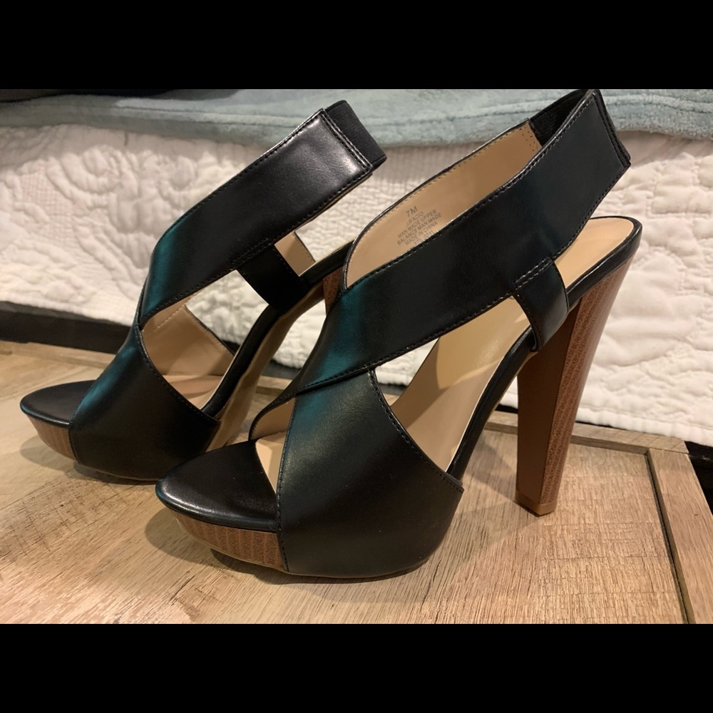 High heels with wood bottom and black leather